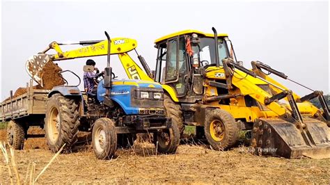 Jcb 3dx Eco Xcellence Machine Loading Mud In Sonalika 35 Di Rx Tractor