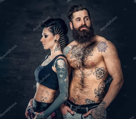 Tattooed Bearded Man And Brunette Woman Stock Photo Fxquadro