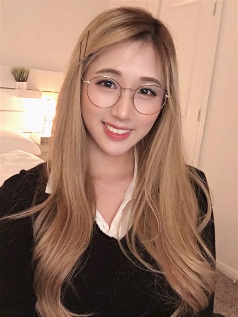 Blonde Asian With Glasses Scrolller