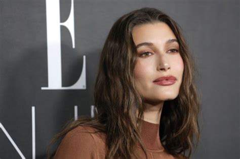 Hailey Bieber Wore The Tiniest Blue Bikini While Plunging In A Tub Of