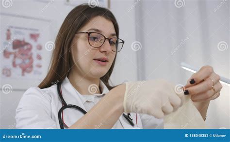 A Doctor In A Hospital Ward Puts On Sterile Gloves Stock Footage