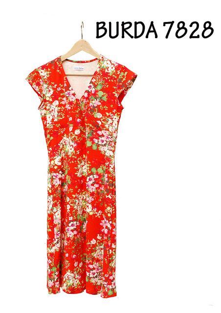 A Red Dress With Flowers On It And The Words Burda 7889