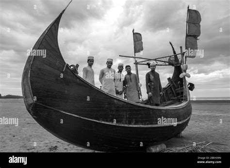 Men On A Moon Shaped Fishing Boat Bay Of Bengal South Of Coxs Bazar