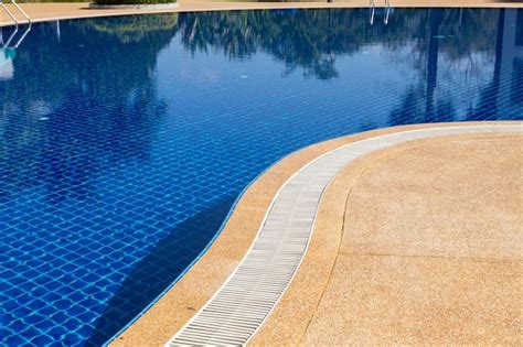 Premium Photo Swimming Pool Edge Overflow Drain White Grating