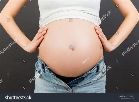 Close Naked Pregnant Womans Belly Wearing Stock Photo 1777360541 Shutterstock