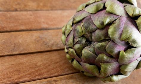 Artichoke On Wood Stock Photo Image Of Flower Green 69519032