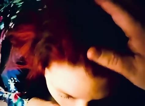 Redhead Milf On Her Knees Sucking Cock And Takes The Cum In Her Mouth And Continues To Suck His