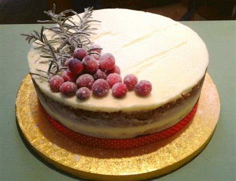 Festive Naked Sponge Cake With Frosted Cranberries And Rosemary