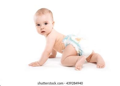Стоковая фотография 439284940 Cute Baby Lying Naked On White