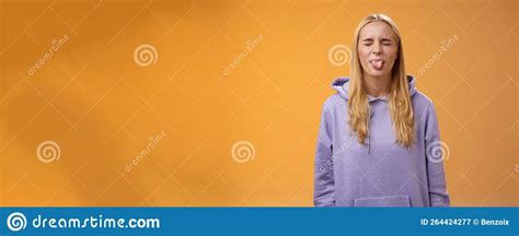 Playful Amused Charismatic Young Funny Blond Girl Having Fun Close Eyes