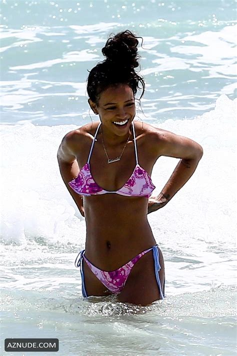 Karrueche Tran Sexy In A Skimpy Pink Bikini While Enjoying A Beach Day In Miami With Her NFL
