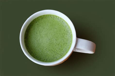 Green Tea With Green Background A Cup Of Hot Green Tea With Green