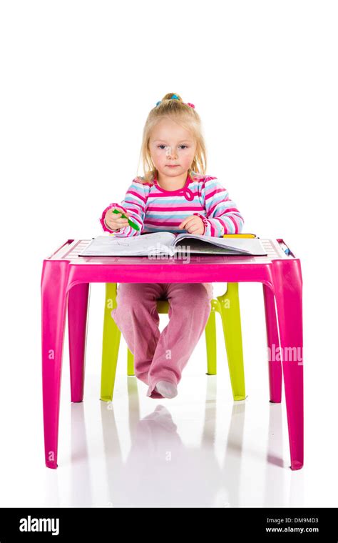 Blond Toddler Girl Painting On White Isolated Background Stock Photo