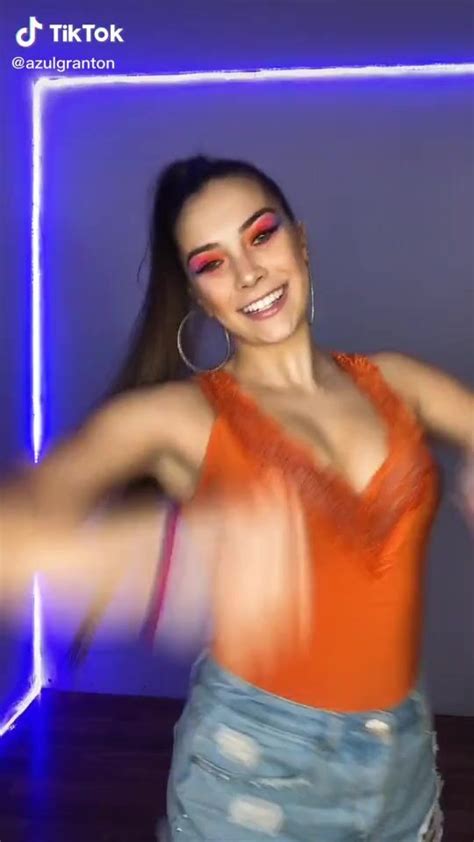 Hot Azul Granton Shows Cleavage In Orange Top Sexyfilter