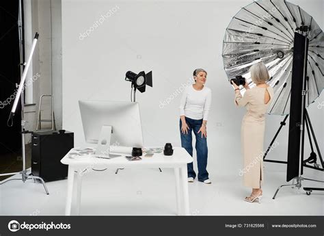 Lesbian Couple Poses Photo Shoot Studio Photographer Wearing Long Dress Stock Photo