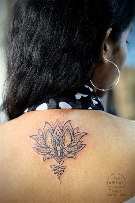 Indian Traditional Lotus Tattoo On Back Of A Beautiful Girl By Tattoo