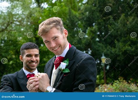 Gay Couple Of Grooms Pose For Photographs After Their Wedding Ceremony Stock Image Image Of