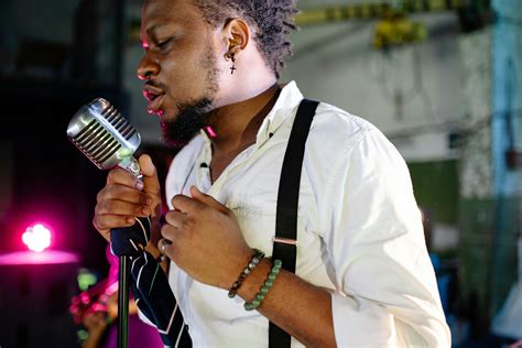 female singer singing emotionally  stock photo