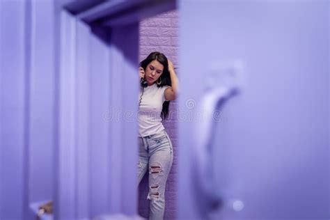 A Lovely Brunette Model Sits In A Lavender Jail Waiting To Plead Her Case Stock Photo Image Of