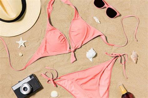 Premium Photo Bikini Hat Camera And Sunglasses On Beach Sand