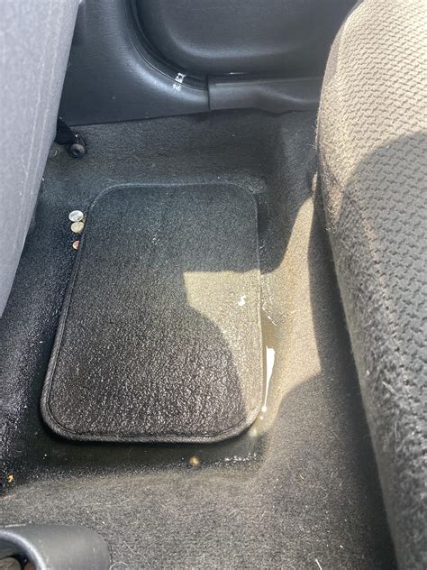 Why Water On Floor Of Car Back Seat: Leak Solutions Unveiled - Dhaka