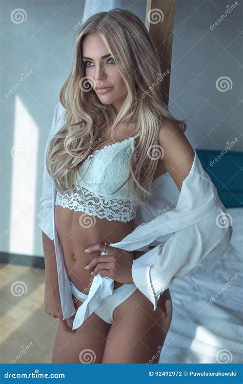 Blonde Woman Posing In Hotel Room Stock Photo Image Of Looking