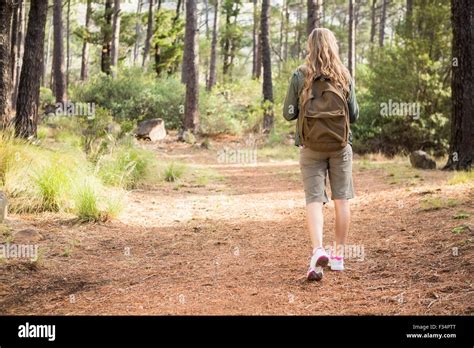 Blonde Hiker Hiking On Path Stock Photo Alamy