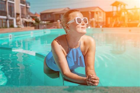 Bikini Clad Woman Enjoys Poolside Relaxation Poolside Ambiance Capturing Woman X27 S Relaxed