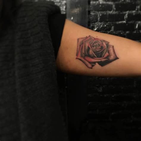 Realistic Red Rose Tattoo Located On The Inner Arm