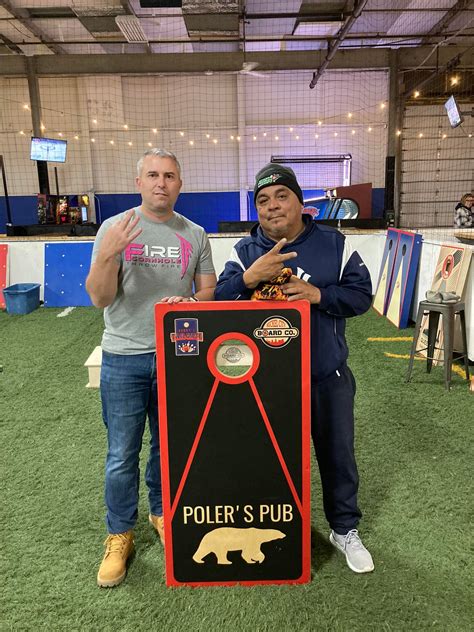 It was another epic cornhole battle at... - Dubby's Tailgate