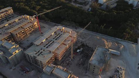 Impressive aerial view unfolds, showcasing bustling construction site