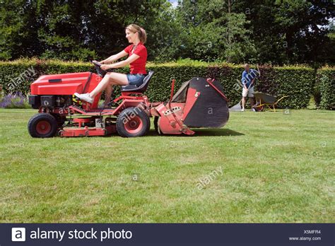 Woman Mowing Grass High Resolution Stock Photography And Images Alamy
