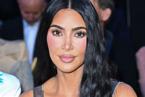 Kim Kardashian Flaunts Figure In Blue Bikini