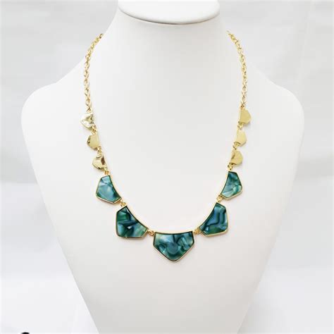arvya green gold statement necklace  turquoise stones