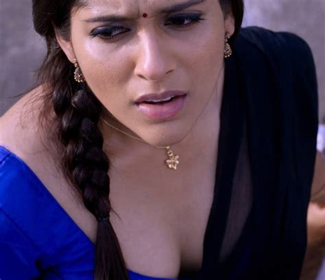 Rashmi Gautam Latest Photo Stills Hot Cleavage In Purpule Mini Skirt In Guntur Talkies Movie