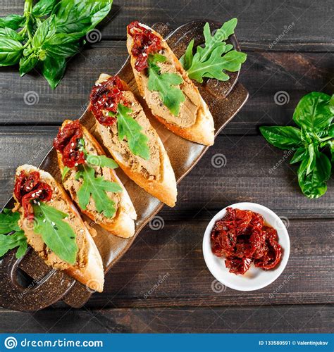 Italian Sandwiches Bruschetta With Meat Pate Arugula Sun Dried