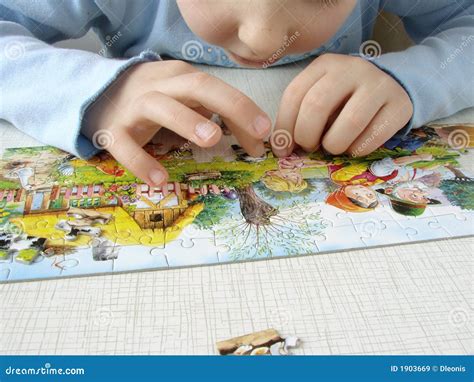 Puzzle Assembling 1 Stock Image Image Of Collect Gather 1903669