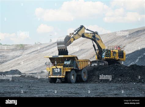 coal loading  excavator  truck coal  industry stock photo