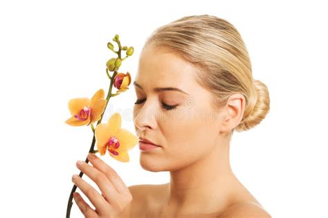 Beautiful Nude Woman With Orange Orchid Flower Stock Photo Image Of