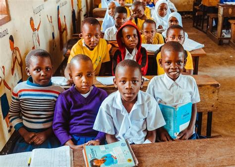 Premium Photo A Group Of African Children Sitting In A Classroom With