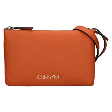 Dámská crossbody kabelka Calvin Klein Ruby oranžová Kabelečky cz