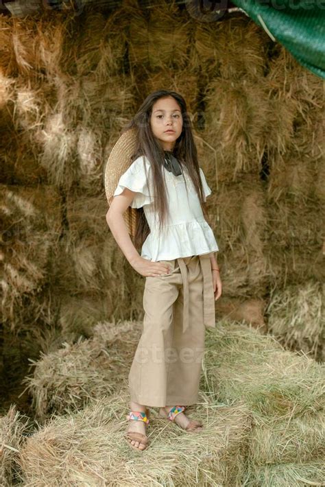 Preteen Brunette Girl Posing On Haystack In Hayloft In Summer Country Estate 36714781 Stock