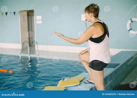 Mature Woman Coach With Whistle By Poolside Stock Image Image Of Lesson Lifestyle
