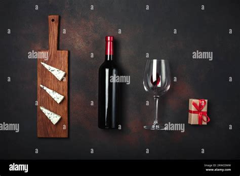Bottle Of Wine T Box Blue Stinky Cheese And Wineglass On Rusty