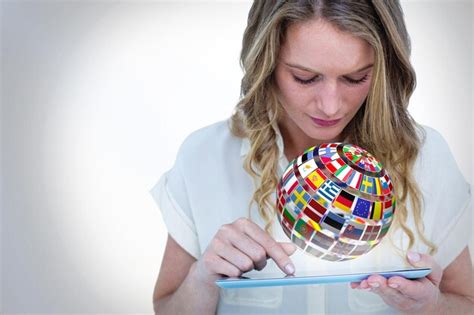 Premium Photo Woman Using Tablet Pc Against Sphere Made Of Flags