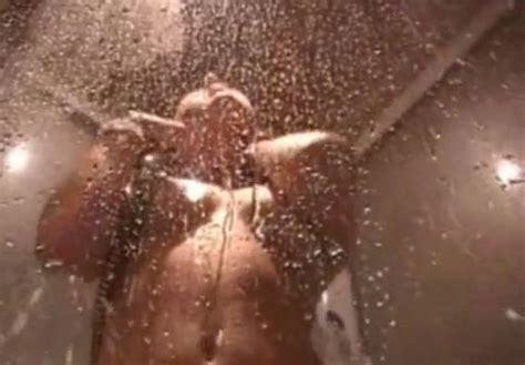 Flat As Field Brunette Stimulates Her Shaved Pussy With Hot Water Stream