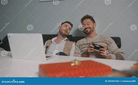 Happy Gay Couple Or Best Friends Playing Video Games Gift In The