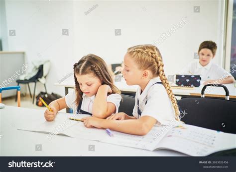 Two School Girls Cooperating Helping Each Stock Photo 2033021456 | Shutterstock