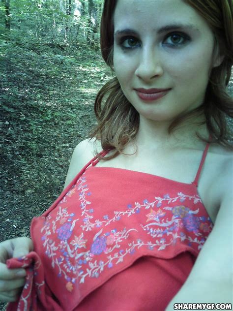 Busty Girlfriend Takes Selfshot Pictures Outdoors Of Her Big Perfect Tits As She Strips Naked