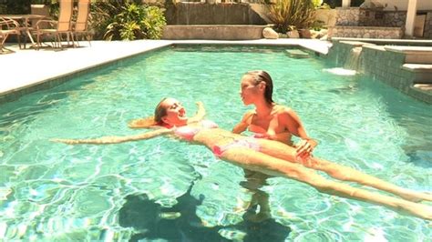 Hot Babes Tease Each Other In The Swimming Pool Until They Carry It On To The Living Room S